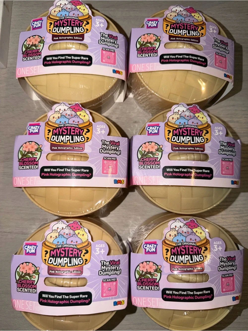 RMS Mystery Dumpling Squishy Cherry Blossom Scented, Pink Holographic. Sealed.